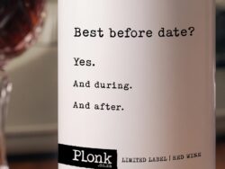 Bottle of Plonk wine showing the best before date label