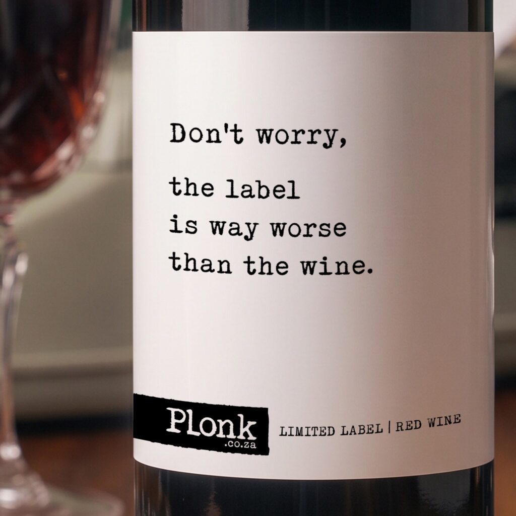 Bottle of Plonk wine showing the don't worry the label is worse than the wine label