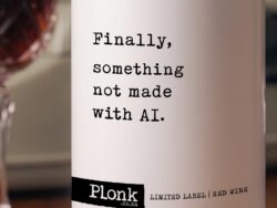 Bottle of Plonk wine showing the finally something not made with ai label