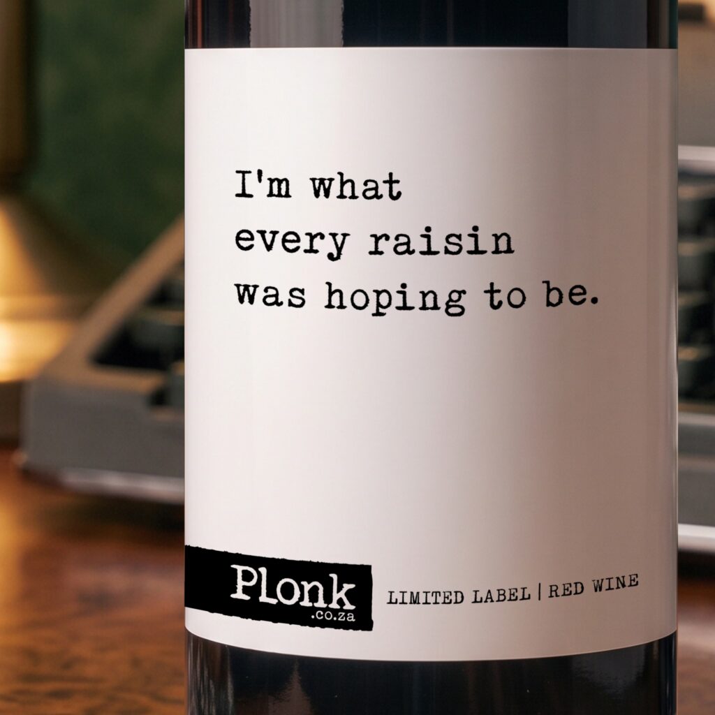 Bottle of Plonk wine showing the im what every raisin was hoping too be label