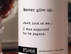 Bottle of Plonk wine showing the never give up just look at me i was supposed to be papsak label