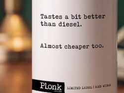 Bottle of Plonk wine showing the tastes a bit better than diesel label